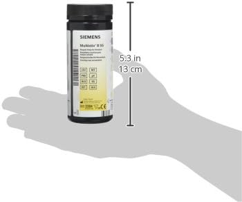 Close-up of a Siemens Multistix 8 SG reagent strip colour chart on the box. on bottle. Hand size
