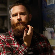 Lifestyle/use image: Uppercut Deluxe Beard Balm 100ml men beard grooming routine