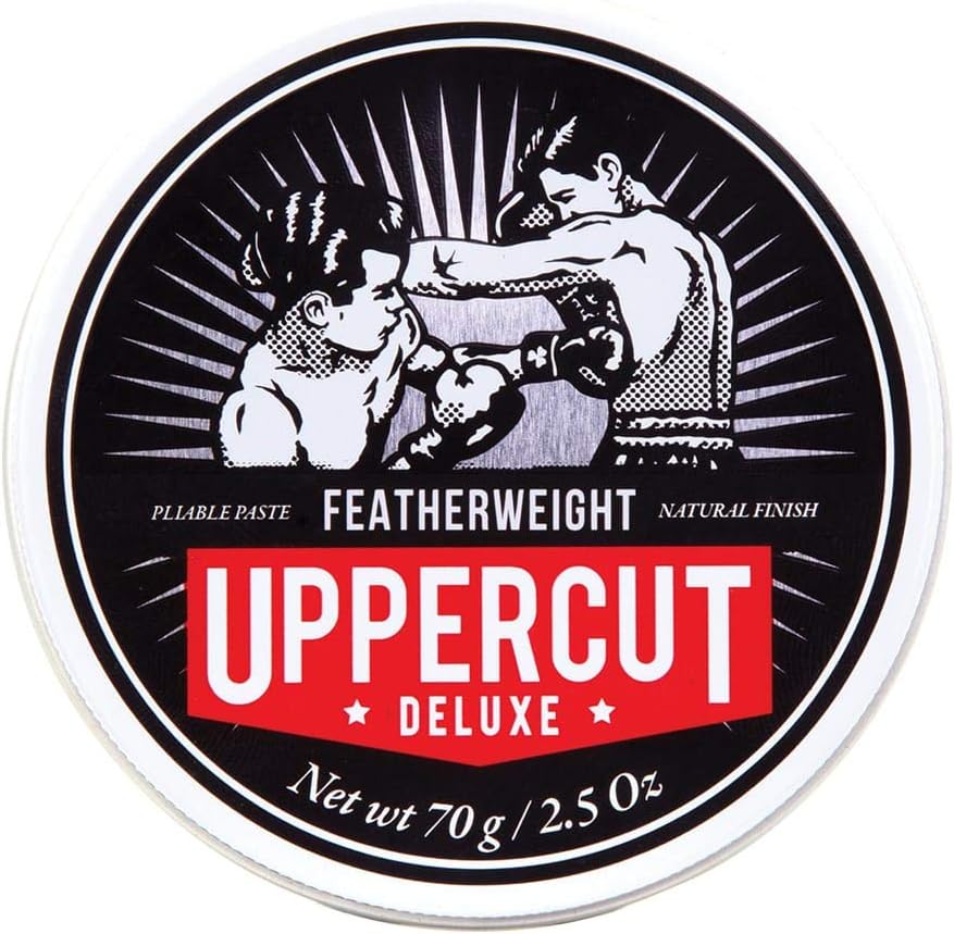Front image: Uppercut Deluxe Featherweight Fiber Paste 70g jar firm hold styling paste packaging