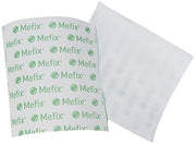 Close-up showing the breathable fabric texture of Mefix tape cut out