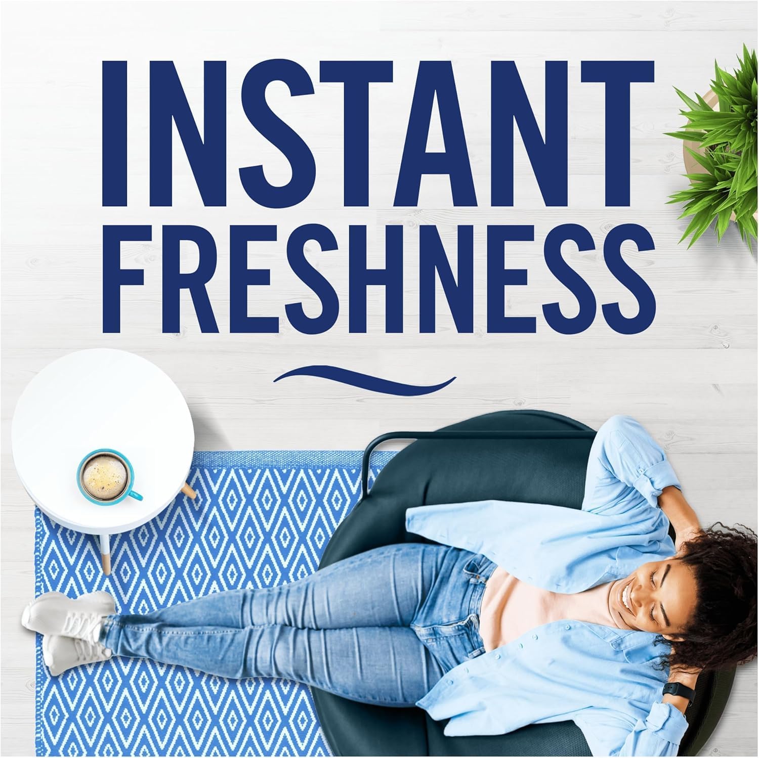 Febreze Air Mist Blossom & Breeze air freshener in a living room