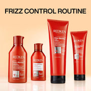Redken Frizz Dismiss Shampoo bottle, sulfate-free, routine.