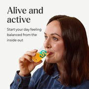 Symprove Liquid Probiotic Pineapple 4 x 500ml probiotic drink lifestyle woman drinking