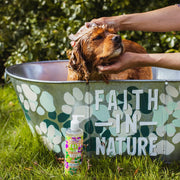Faith In Nature Deep Cleansing Dirty Dogs Lavender Shampoo 400ml bottle packaging being used on a dog