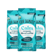 Four Sigmatic Organic Decaf Ground Coffee 340g, 3 pouches front packaging on white background