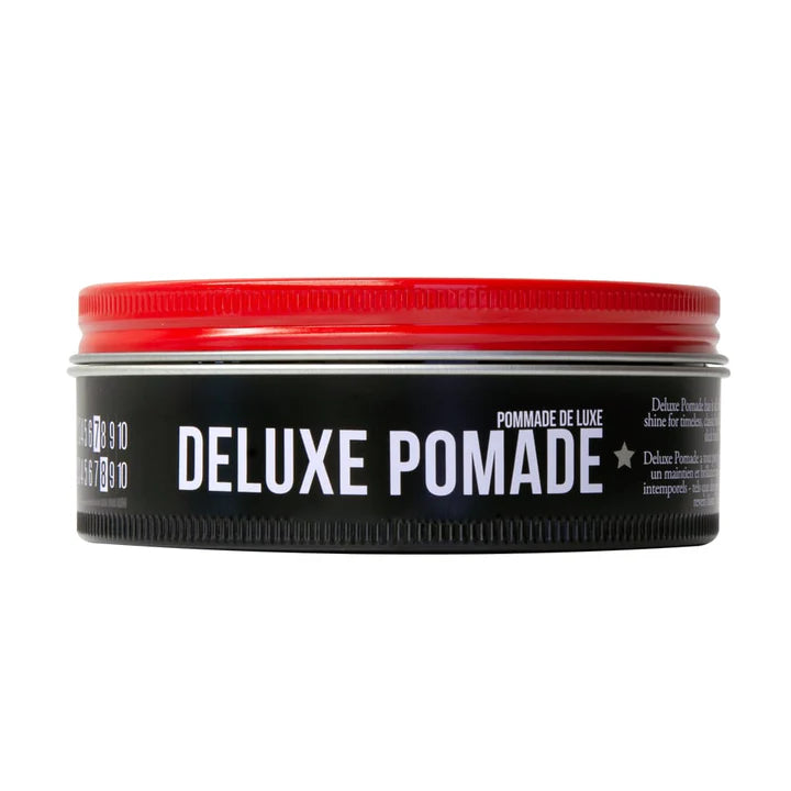 Side image: Uppercut Deluxe Pomade 100g jar strong hold high shine styling product packaging