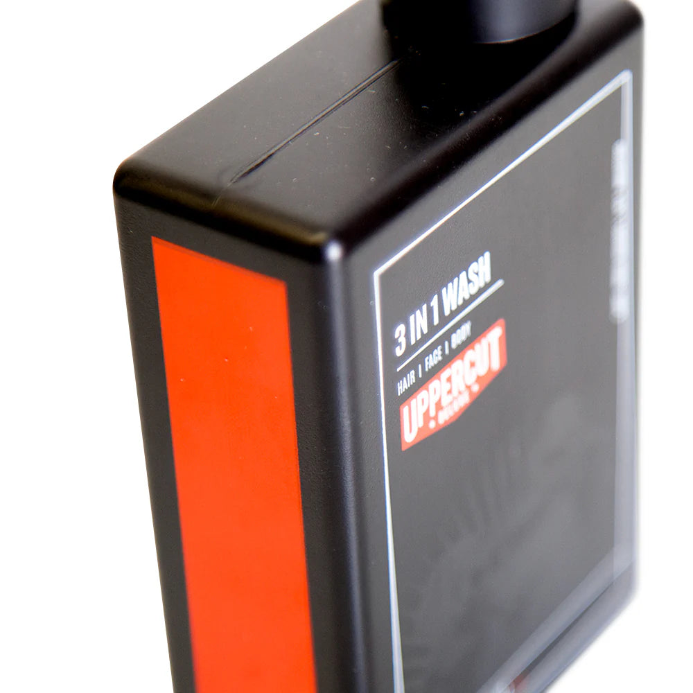 Side image: Uppercut Deluxe 3 in 1 Hair Face Body Wash 240ml bottle Bay Rum fragrance packaging