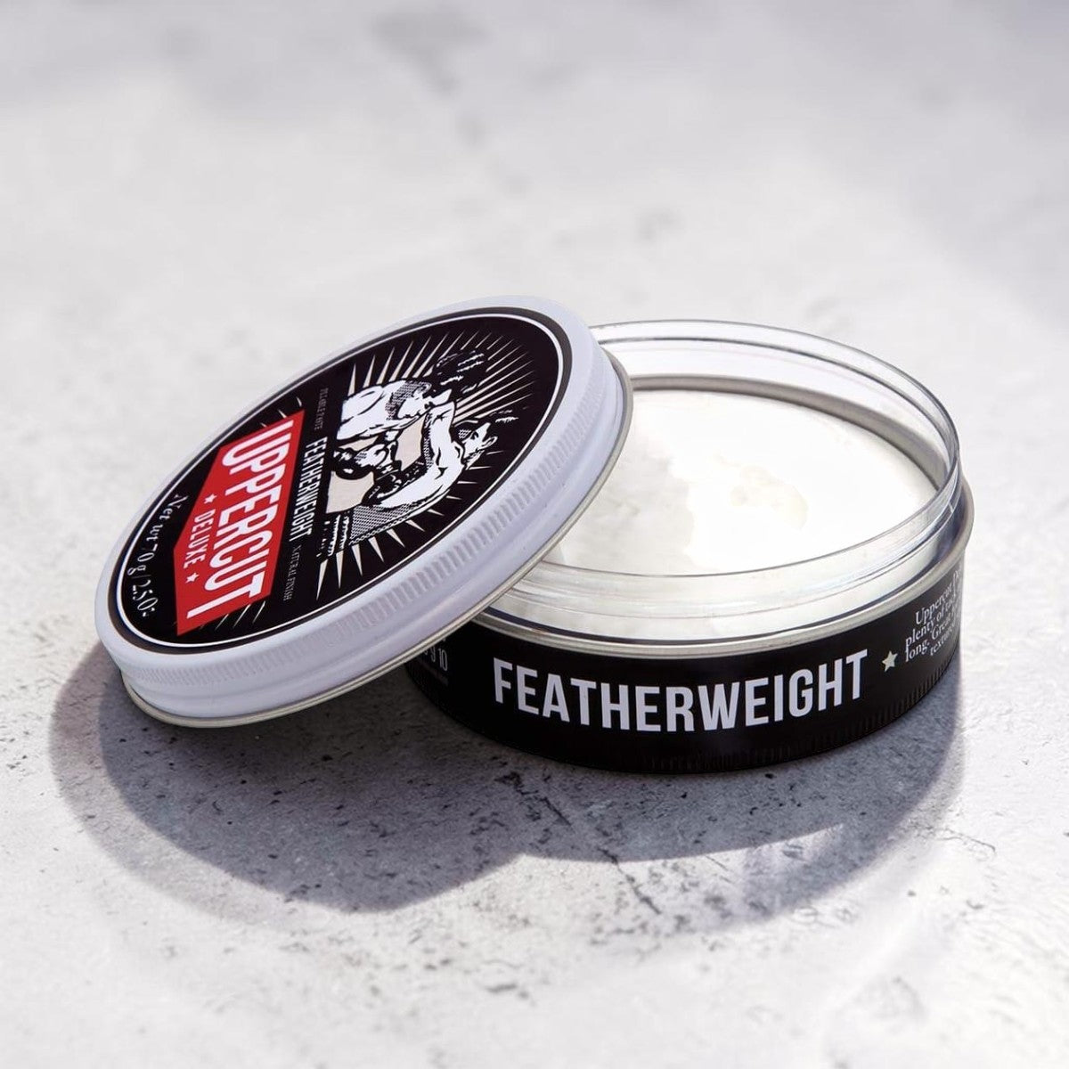 Uppercut Deluxe Featherweight Fiber Paste 70g jar firm hold styling paste packaging