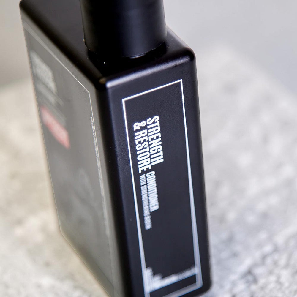 Uppercut Deluxe Strength and Restore Conditioner 240ml bottle mandarin patchouli fragrance packaging