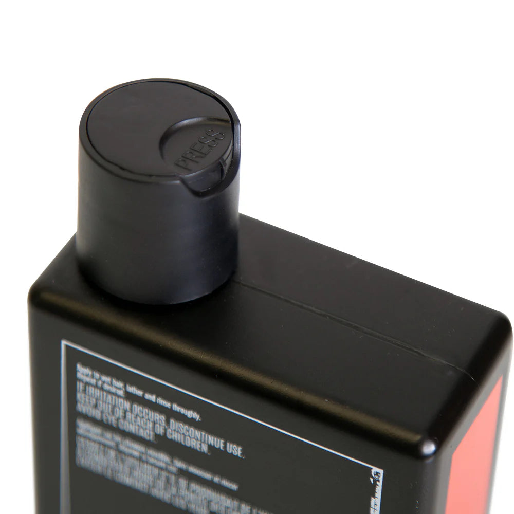 Side image: Uppercut Deluxe Strength and Restore Shampoo 240ml bottle mandarin patchouli fragrance packaging