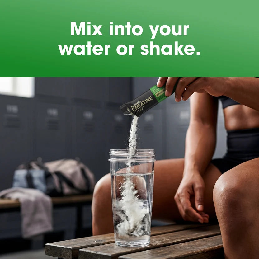 Optimum Nutrition Micronised Creatine Fruit Punch 10 x 4.5g sachets shown beside a glass of water
