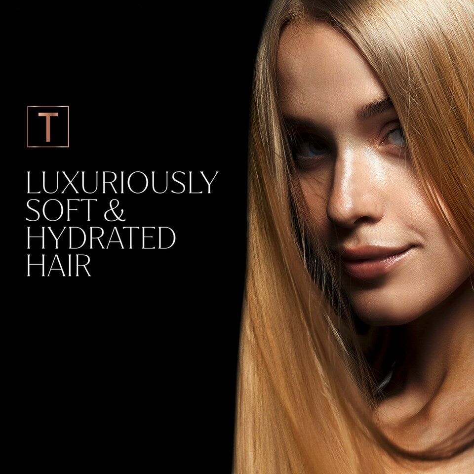 TRESemmé Rich Moisture Conditioner with Vitamin E 680ml bottle displayed alongside hair care products