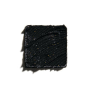 Lumin Charcoal Face Scrub for Men, on white background.