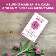 Nutra Meno product packaging with pink flowers on a wooden surface